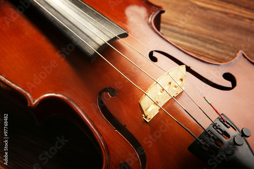 Violin on wooden background