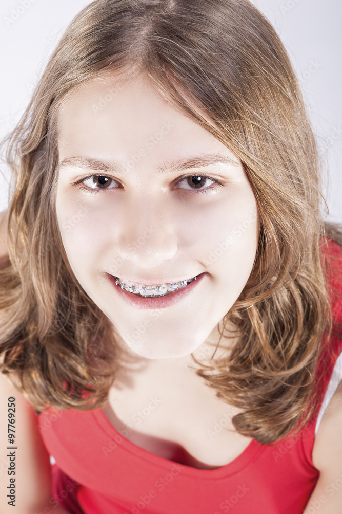 Naklejka premium Medicine and Dental Concepts and Ideas. Smiling Teenager Girl Te