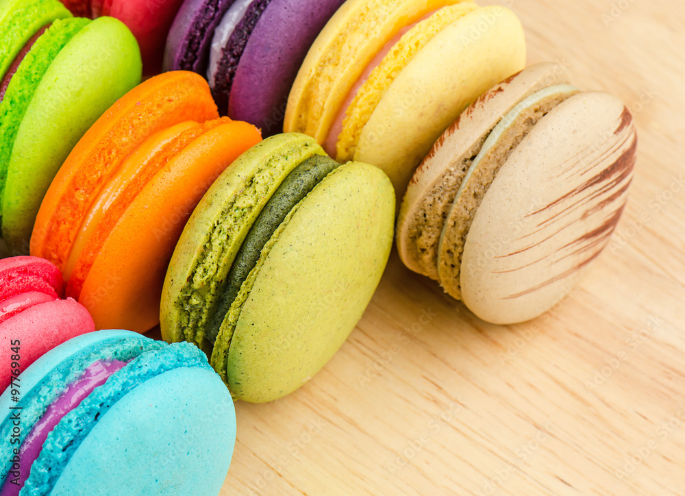 Tasty Sweet Macaroons on wooden background. Tasty Sweet Macaroons on wooden background.