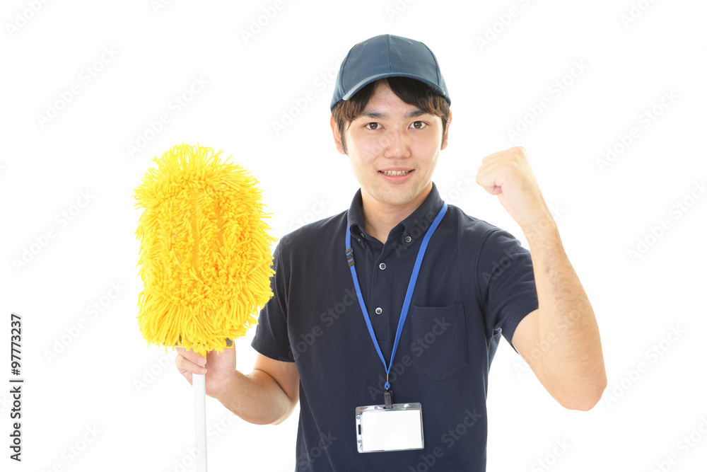 ガッツポーズの清掃員