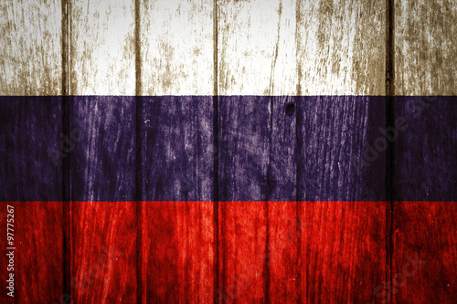Russia Flag on old wood background 