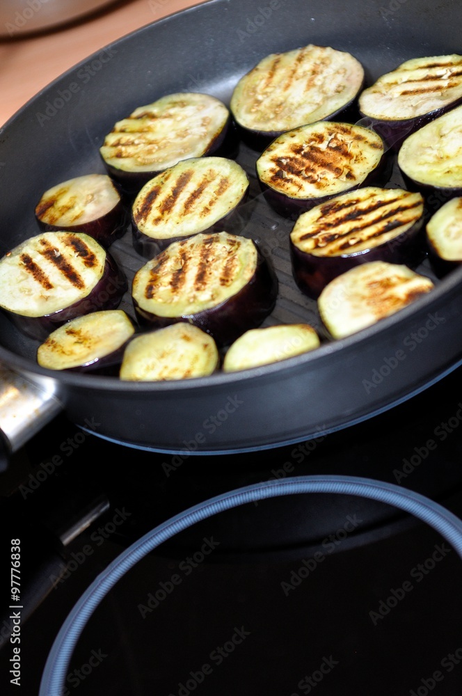 Sliced zucchini in pan on table, closeup Sliced zucchini in pan on table, closeup