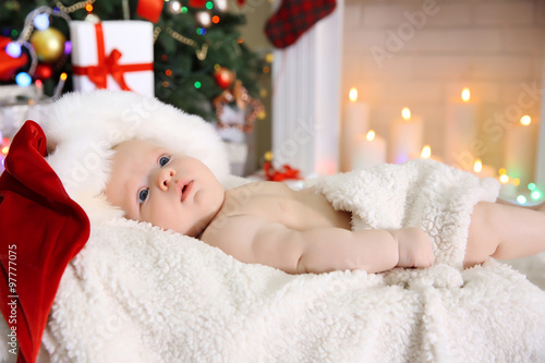 Cute naked baby in red hat ...