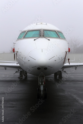 Jet plane in the fog