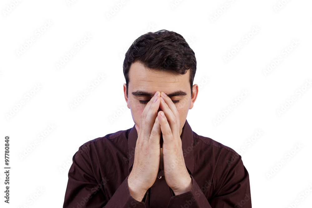 Stressed,frustrated,depressed portrait of a young student, man, holding his hands up on head isolated on grey background.Facial expression, Stressed,frustrated,depressed portrait of a young student, man, holding his hands up on head isolated on grey background.Facial expression,