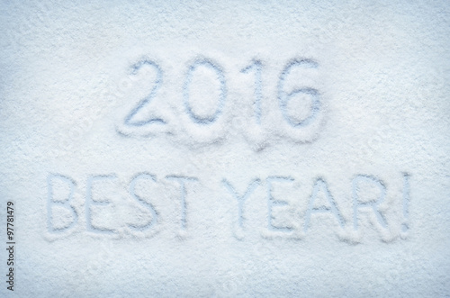 Text 2016 BEST YEAR written on snow. Horizontal postcard.