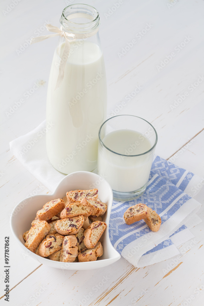 Milk and cookies on white background Milk and cookies on white background