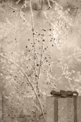 beige background from christmas tree decorations and dry plants