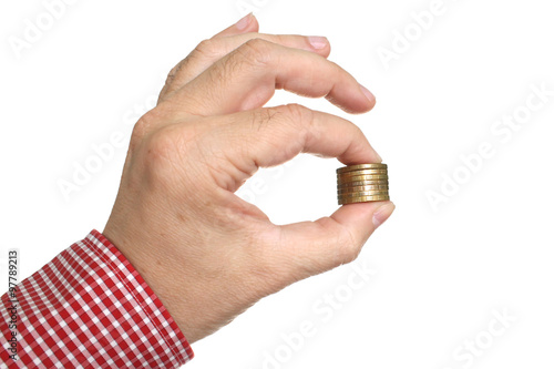 Hand hold the stack of coins