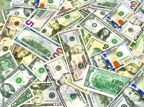 Business and financial concept. Heap of dollar bills abstract background  