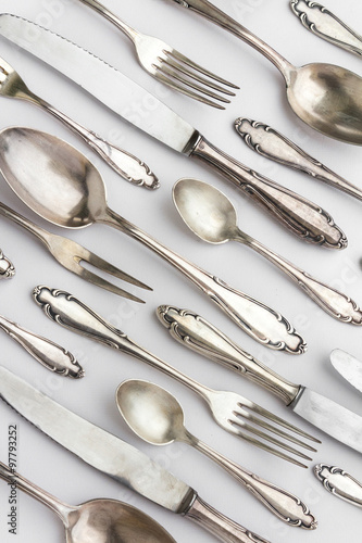 beautiful sterling cutlery set on white background