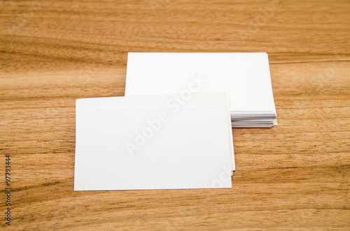 business card presentation for promotion on wooden table