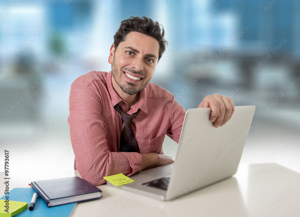businessman working at office computer happy satisfied and successful businessman working at office computer happy satisfied and successful