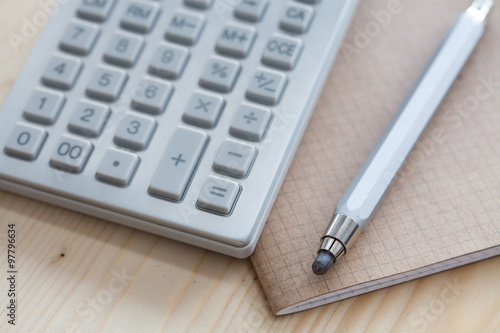 calculator pencil and notebook