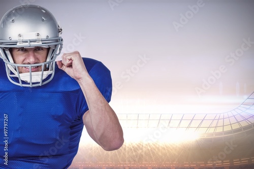 Composite image of american football player standing   © vectorfusionart