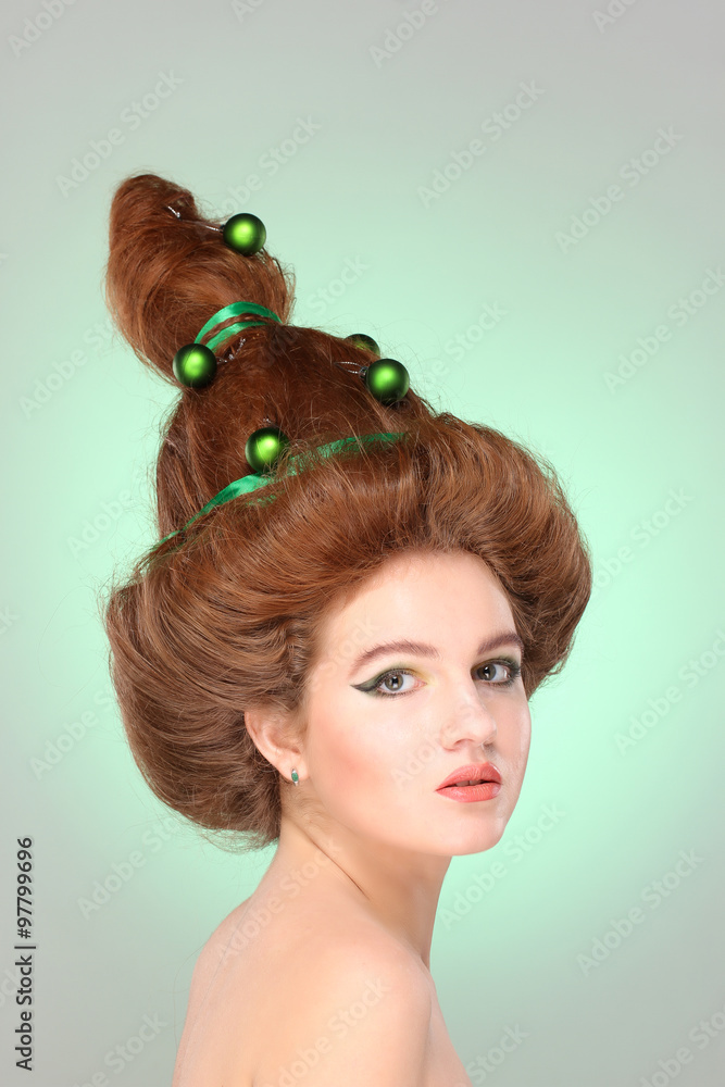 Naklejka premium Christmas Woman. Beautiful New Year and Christmas Tree Holiday Hairstyle and Make up. Beauty Girl Portrait. Colorful Makeup, Hair, 