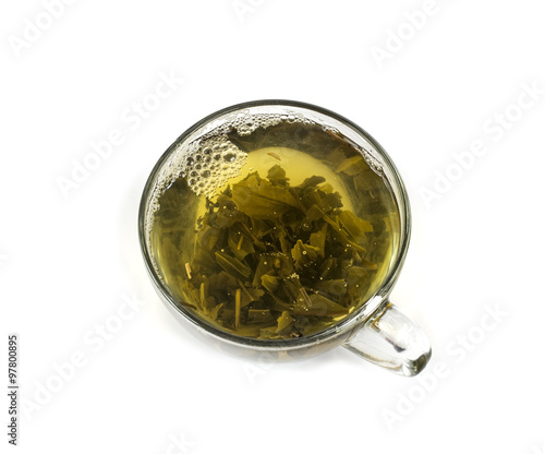 Glass cup of green tea isolated on white