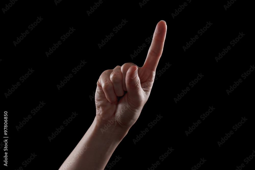 Gesture, young woman's hand indicates the direction or touch devices Gesture, young woman's hand indicates the direction or touch devices