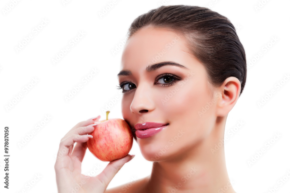 Woman with a ripe apple, isolated on white Woman with a ripe apple, isolated on white