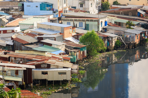 Colorful squatter shacks and houses in a Slum Urban Area in early morning, Ho Chi Minh City, Vietnam