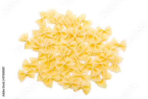 Bowtie Pasta from Above – Uncooked pasta photographed from above, on a white background.
