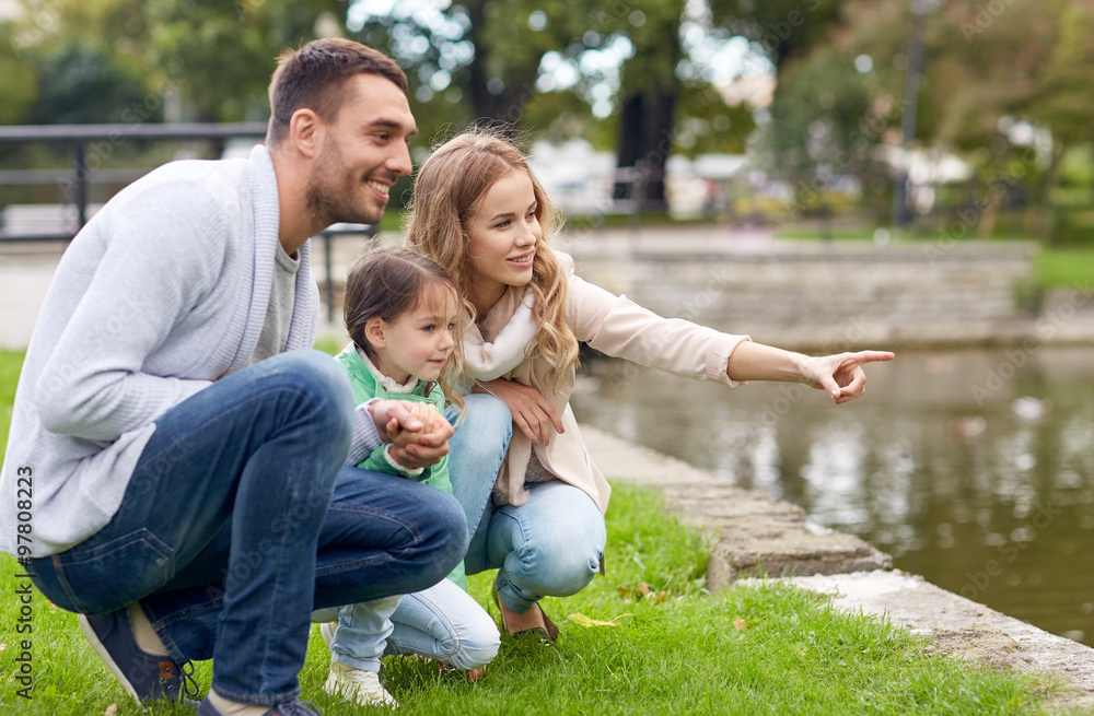 Fototapeta premium happy family walking in summer park