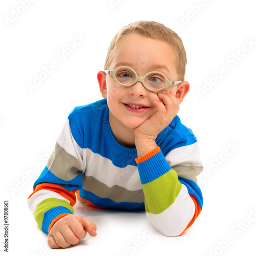 Portrait of cute smiling boy with glasses on a white background