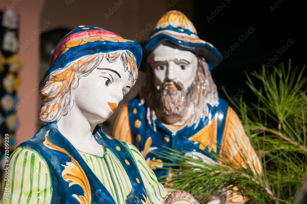 Painted pottery statue of shepherd in the ceramic nativity scene of an artisan in Caltagirone