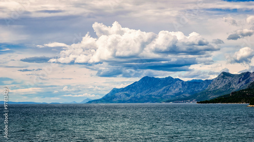 Clouds over the hills by the Adriatic sea in Croatia in summer