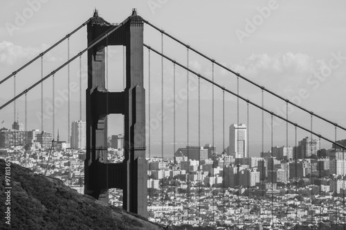 Golden Gate bridge seen from Marin County, with view of San Francisco across the bay on a clear winter's day.