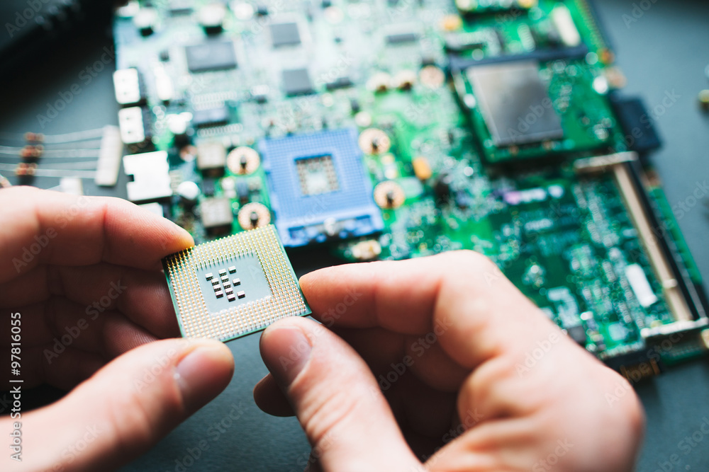 Analysis (installing) of processor in CPU socket Stock-Foto | Adobe Stock