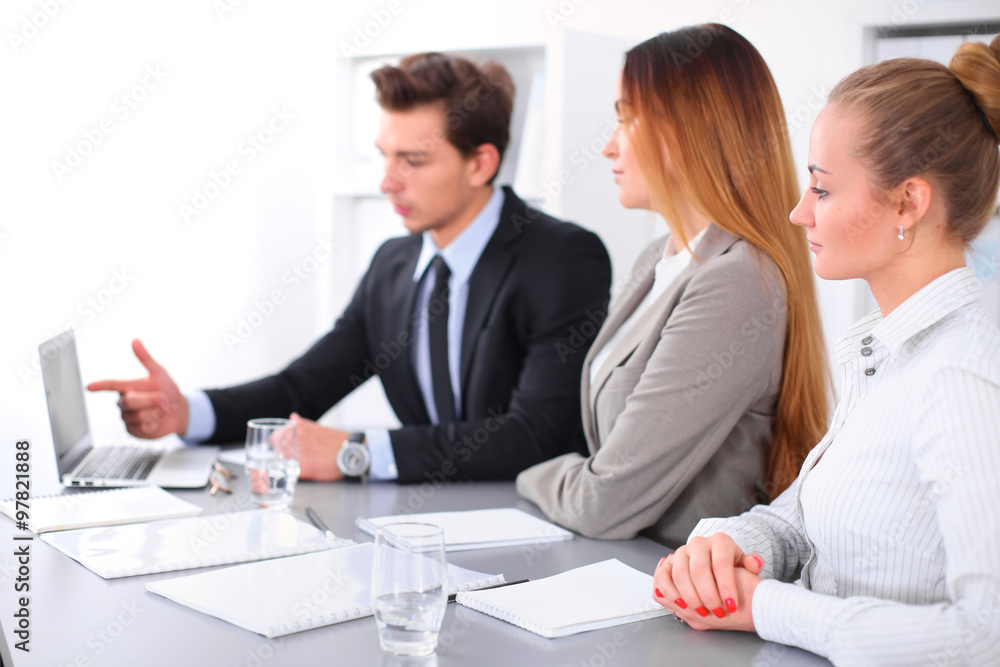 Group of Business people at meeting, focus on blond business woman Group of Business people at meeting, focus on blond business woman