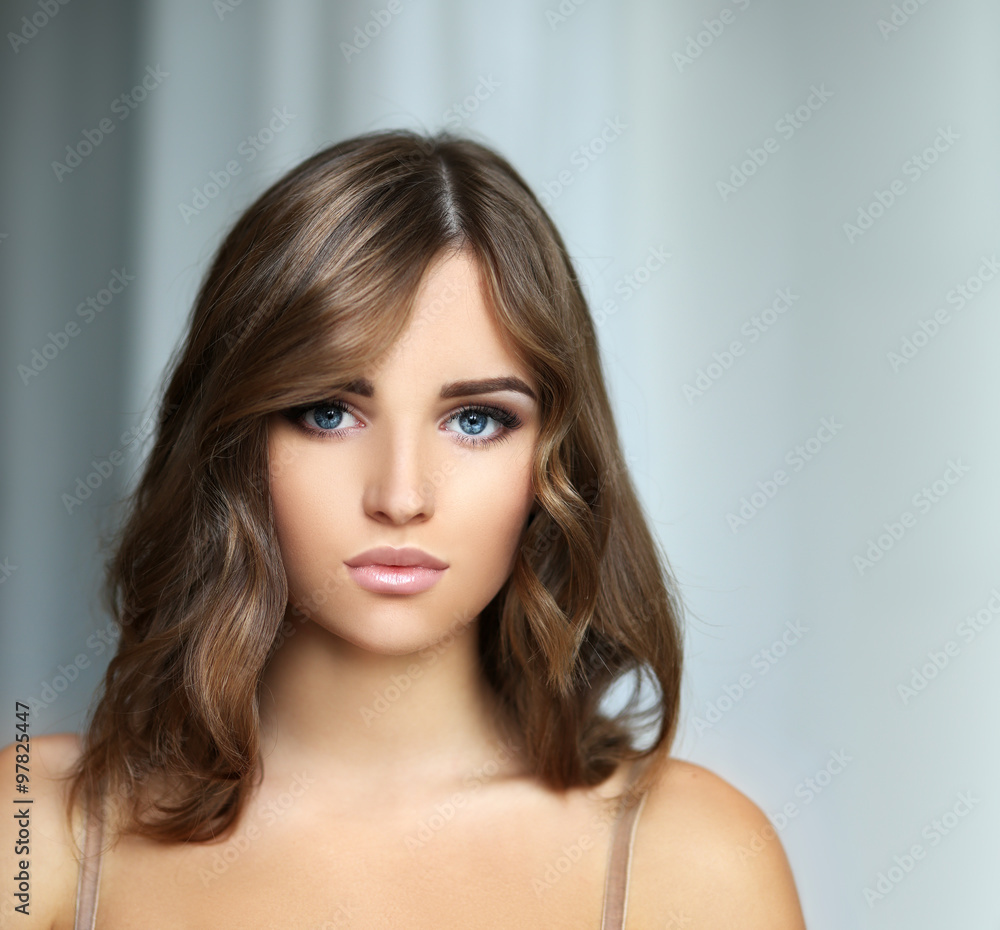 Portrait of a young blond girl with blue eyes Portrait of a young blond girl with blue eyes