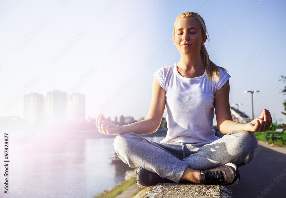Young girl in yoga pose 