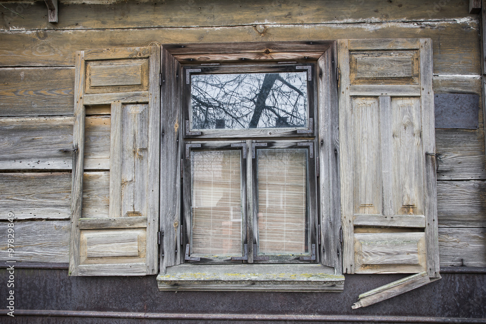 Wooden abandoned village house window background. Wooden abandoned village house window background.