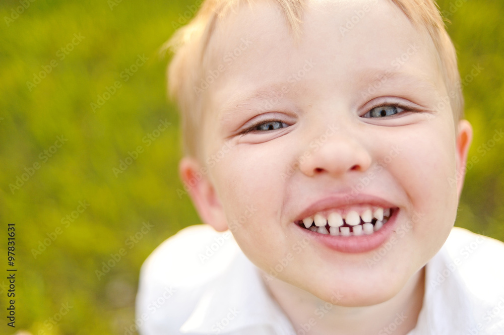 Portrait of a boy in the summer outdoors Portrait of a boy in the summer outdoors