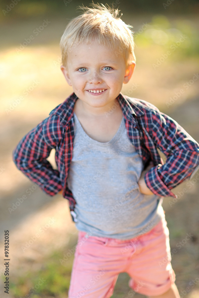 Portrait of a boy in the summer outdoors Portrait of a boy in the summer outdoors