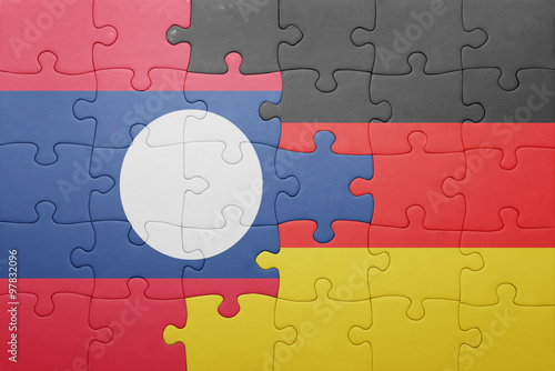 puzzle with the national flag of germany and laos