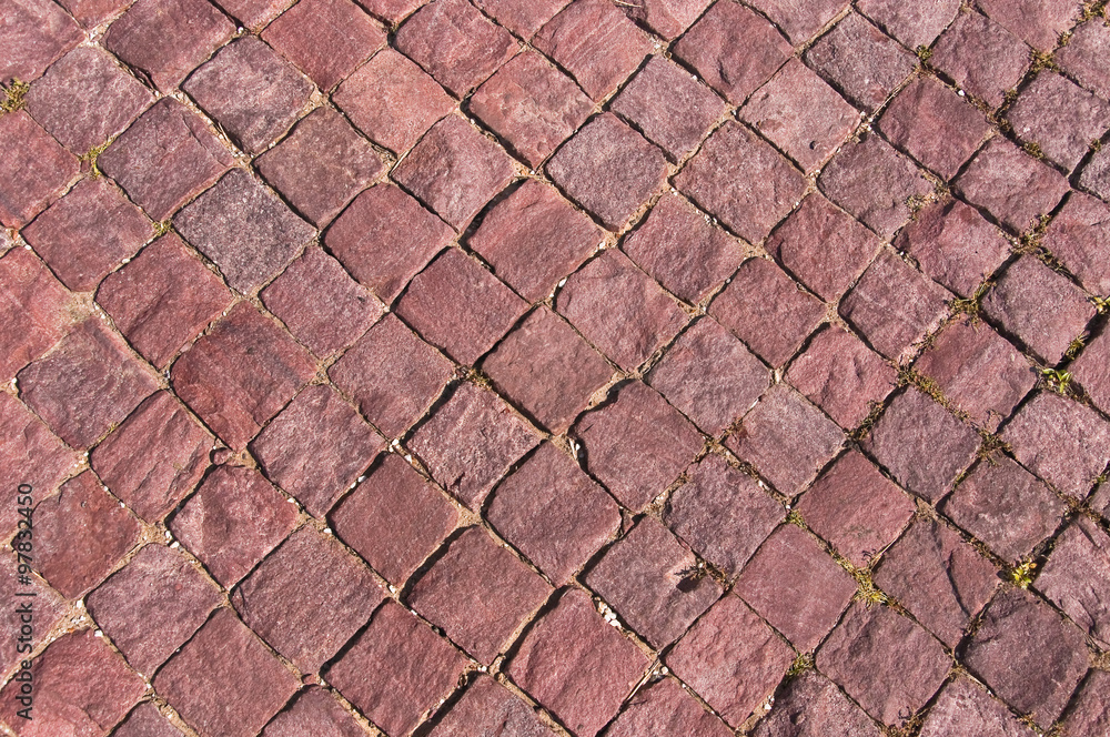 Background texture of red granite paving stone Background texture of red granite paving stone