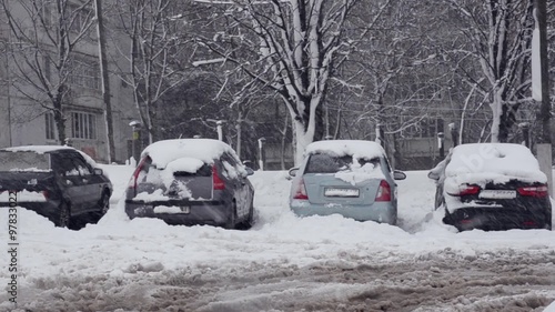 Wallpaper Mural Snow-covered cars parked in a snow storm Torontodigital.ca