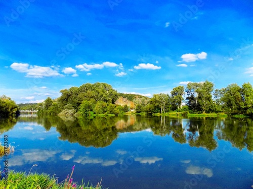 Lake with reflexion  trees and sky