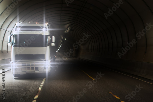 Truck in a long road tunnel