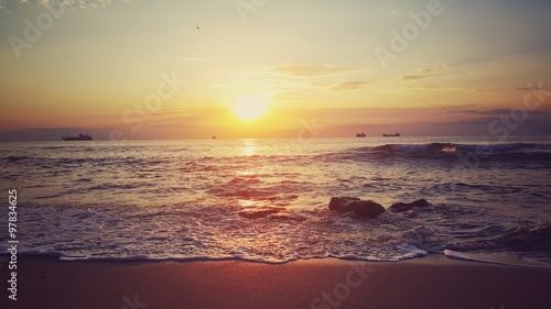 Sea landscape, beautiful sunrise on the beach