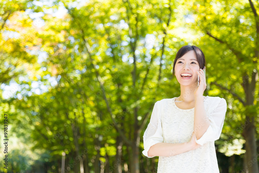 portrait of young asian woman in park portrait of young asian woman in park