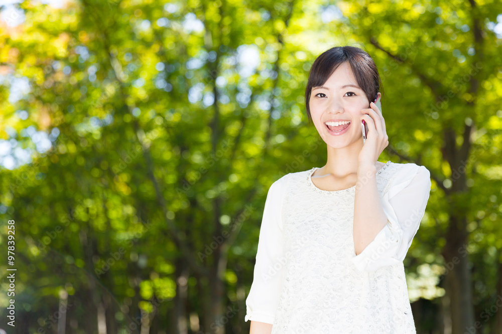 portrait of young asian woman in park portrait of young asian woman in park