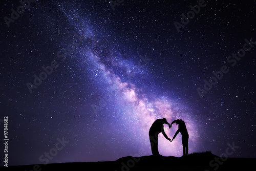 Milky Way. Man and woman ho...