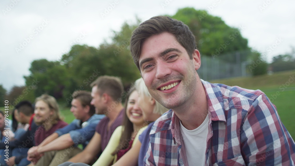 Happy close friends together outdoors Could be student group or young Christians Happy close friends together outdoors Could be student group or young Christians