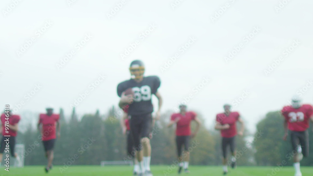 American football players at team practice