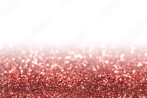 Red sparkle. Glitter background. Holiday blurred background.