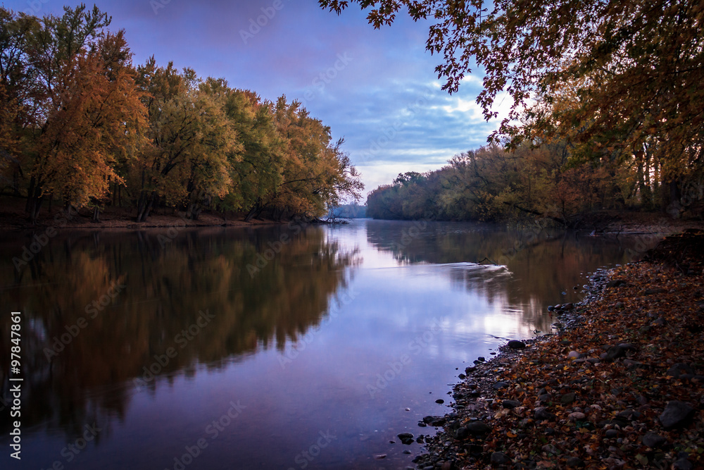 Fototapeta premium Peaceful and Serene River with Sky Reflections. Natural Beauty Background with Gorgeous Copy Space.